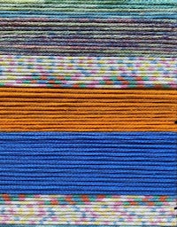 a blue, orange, yellow, green, and blue yarn skein