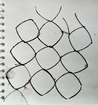 a drawing of a grid of squares on a piece of paper